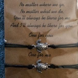 Set of 2 sea turtle bracelets.